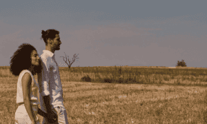 Young black woman praying for her husband, while walking in nature!