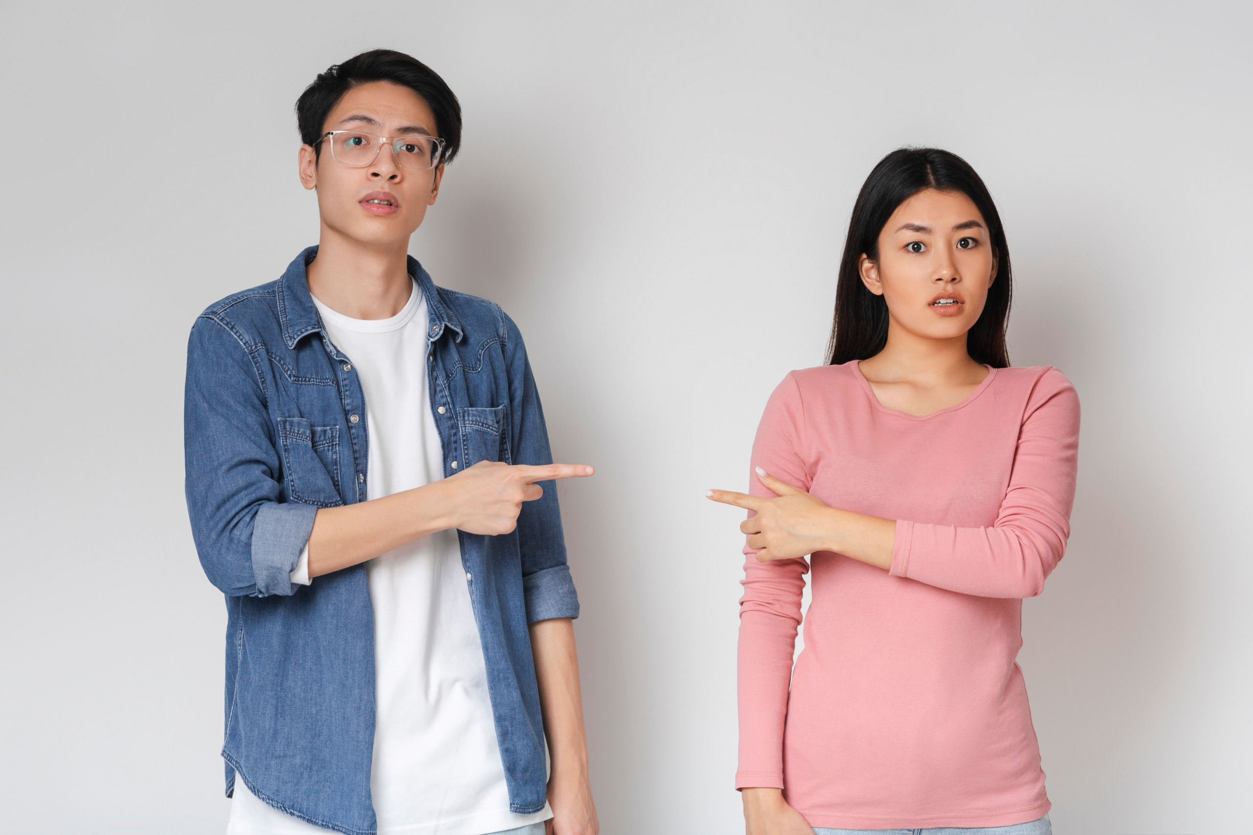 A husband and a wife having a hard time. As a result they are simply blaming each other.