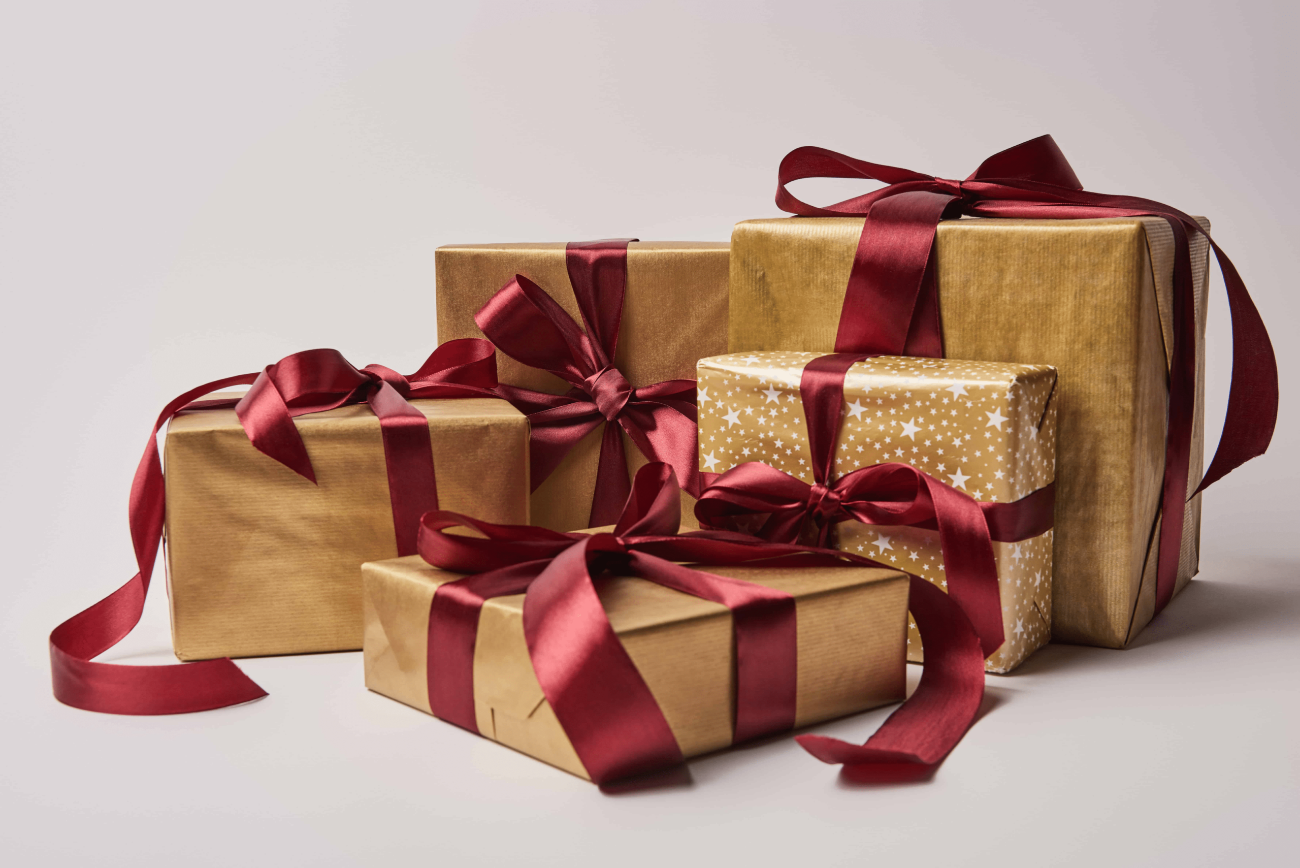 Gold gifts wrapped in lovely bows