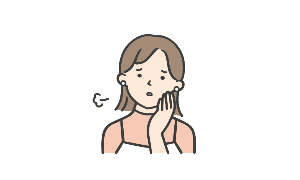 a woman with a hand up to her face blowing a sigh of air as she worries about life.