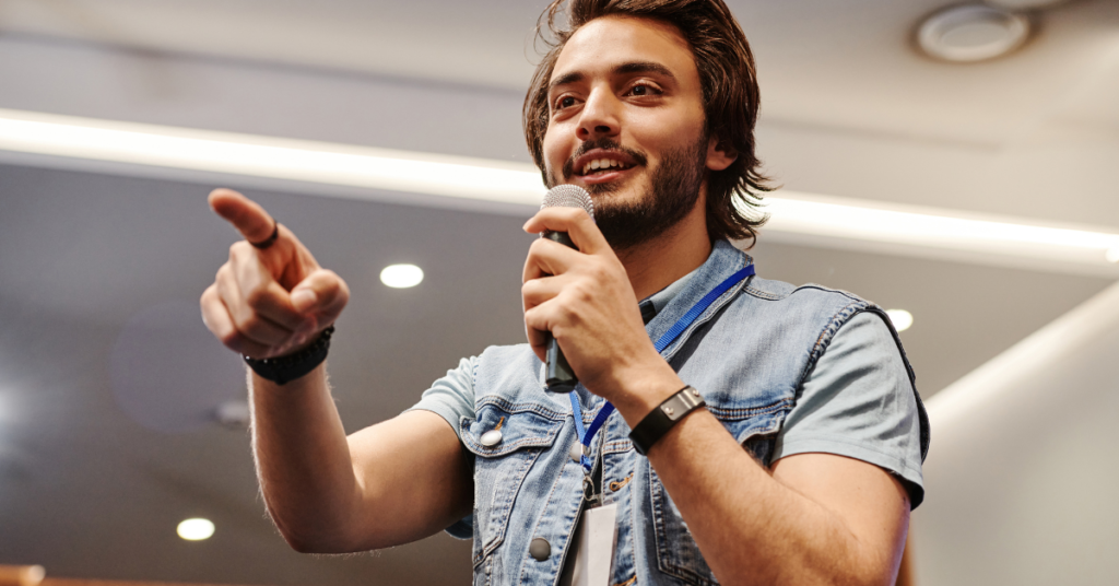 guy talking on a microphone