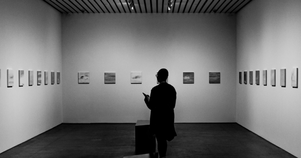 A guy in a room by himself looking around.